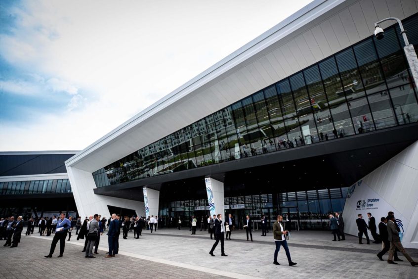 People queue to enter SPE Offshore Europe in 2019