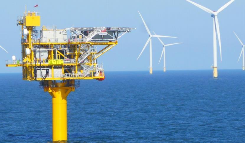 IOG's Blythe topside, with the Dudgeon Offshore Wind Farm in the background.