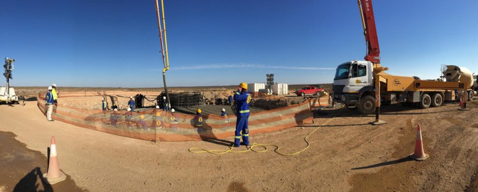 A panorama of a crane moving equipment