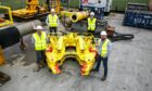 Decom Engineering 4: Pictured beside Decom Engineering’s new 24" Chopsaw (Left to right) Business Development Managers Scott Eke and Matthew Drumm; Commercial Director Nicholas McNally; CEO Sean Conway.