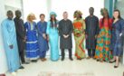 Group of people, some in Senegalese dress