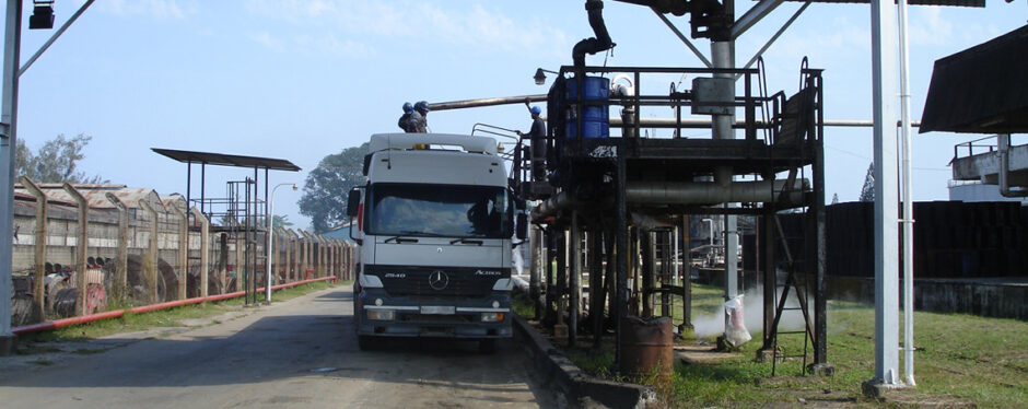 A lorry hooks up to a loading platform