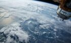 Satellite flying above the world