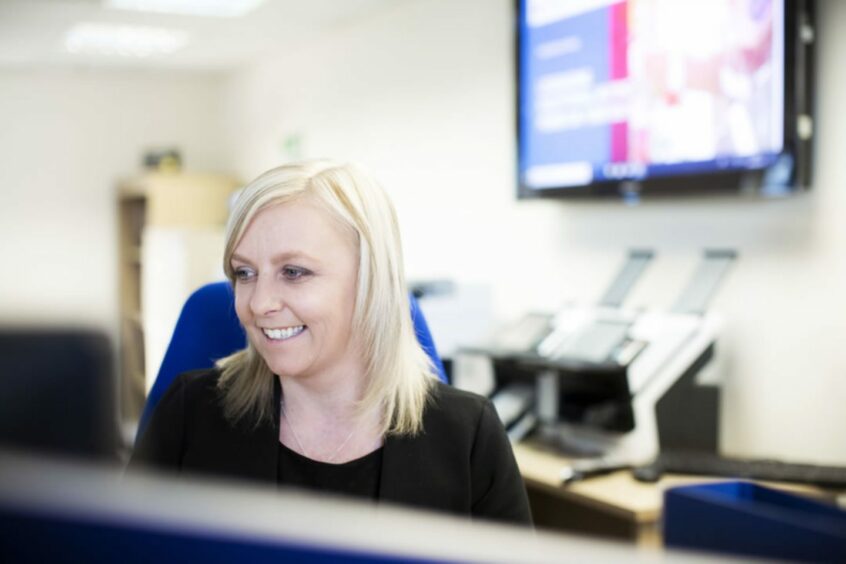 Carol Ross, general manager, Aberdeen, keeps track of the latest orders for Craig International.