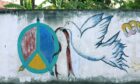 Peace mural in Dili, East Timor. Photographer: Damon Evans