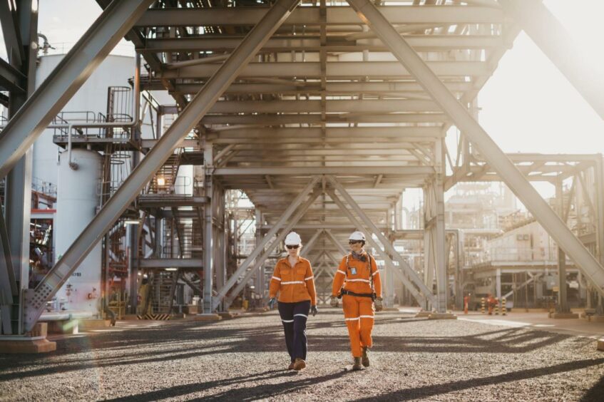 Workers at the Pluto LNG plant, which would receive production from the Scarborough project