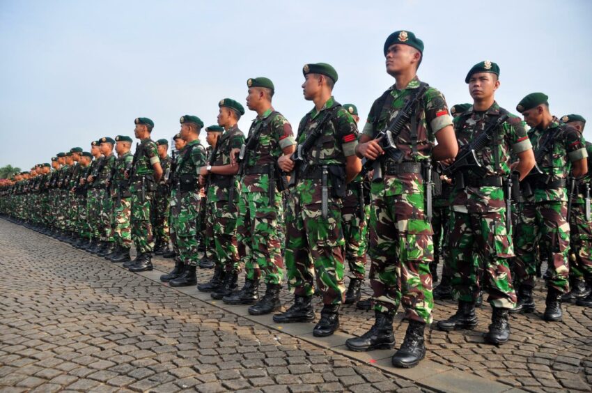 Jakarta, Indonesia. 15th Apr, 2015. Troops from various units pictured on parade at a ceremony of Asian-African Conference security forces at the National Monument in Jakarta. Shutterstock.