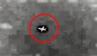 A red ring around a grainy picture of an F16