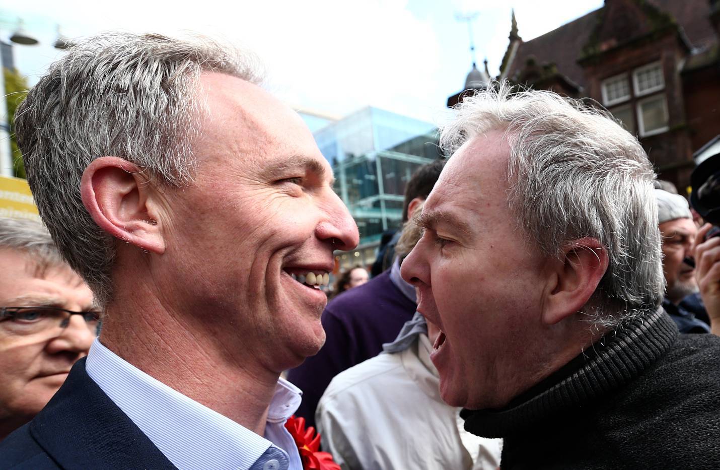 Jim Murphy, the leader of the Scottish Labour Party, is confronted by a protester as he campaigns with comedian Eddie Izzard