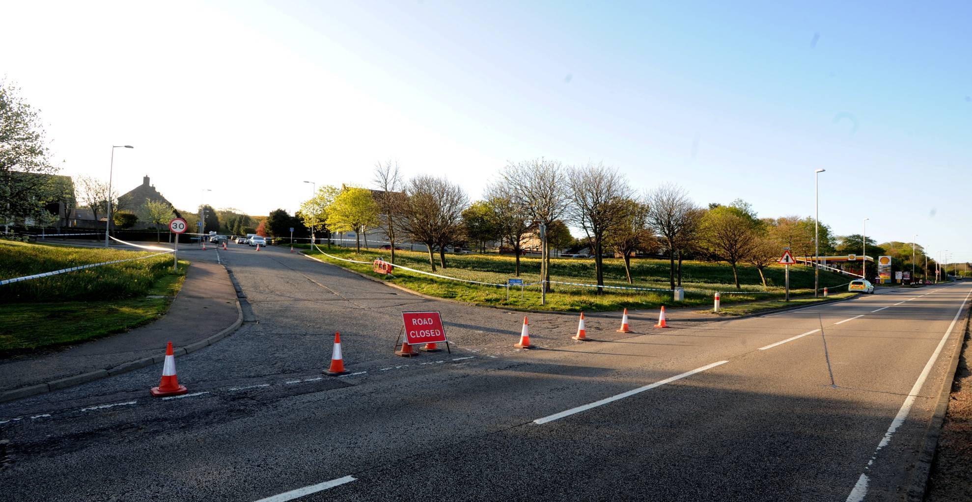 Pictured is the police cordon on Nigg Way, Kincorth.