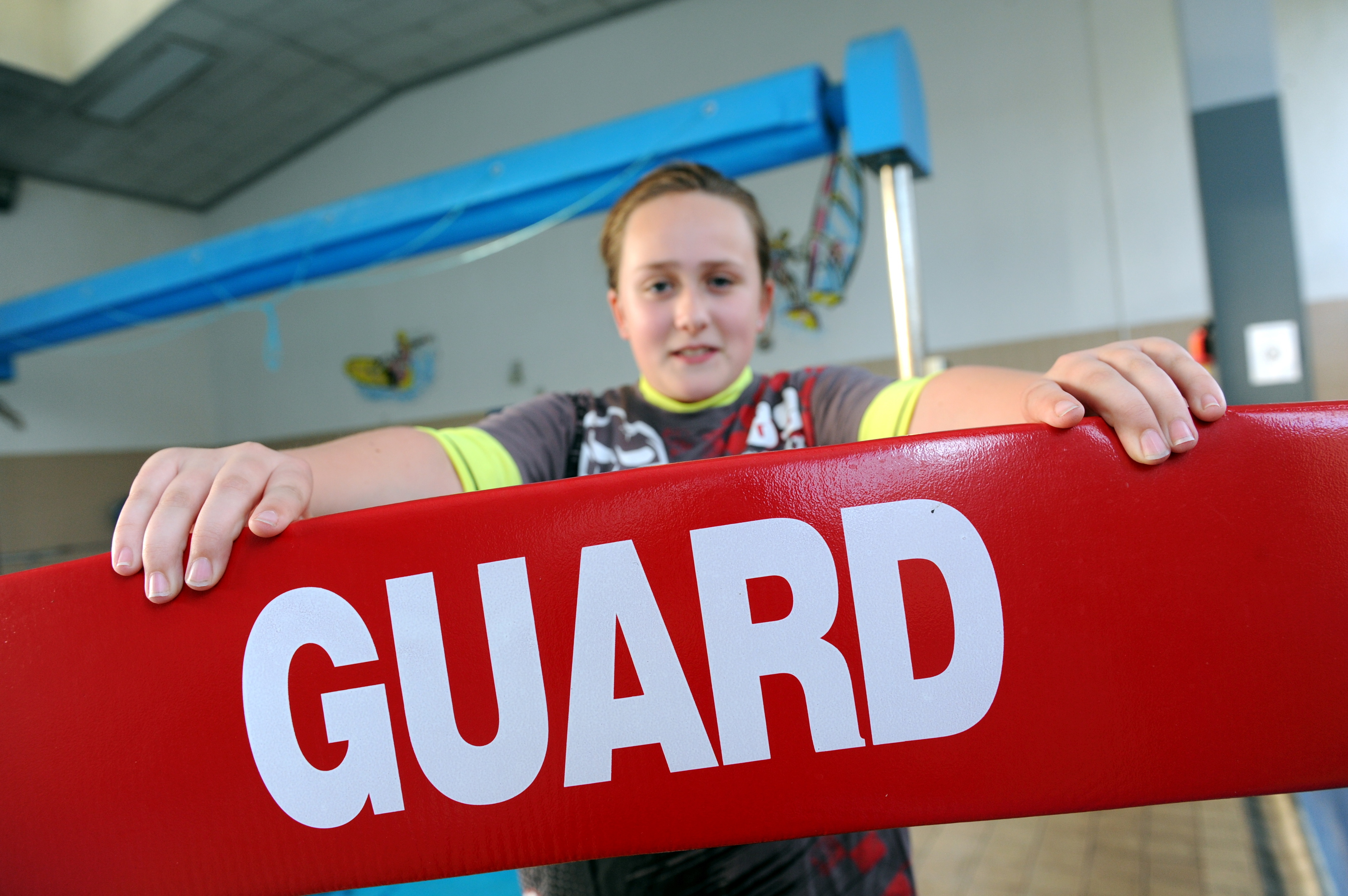 Becky, a rookie lifeguard, has been swimming since she was seven and is working towards her gold level.