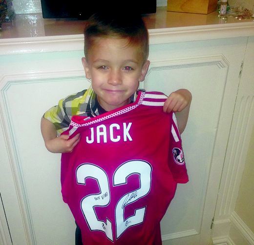 Dons skipper Ryan Jack donated a signed top to Ashton.