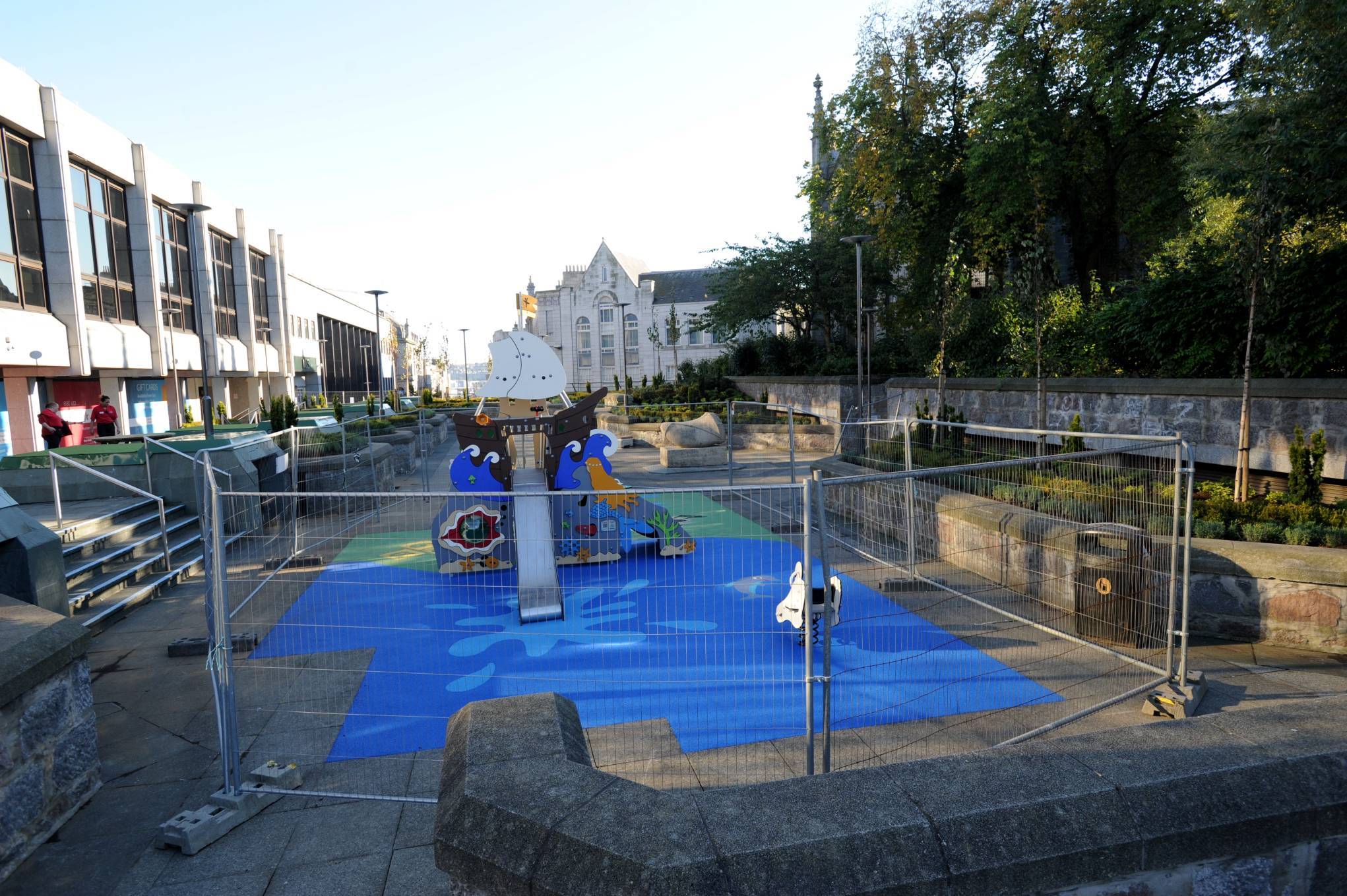 The new play area and garden above the St Nicholas Centre. pictures