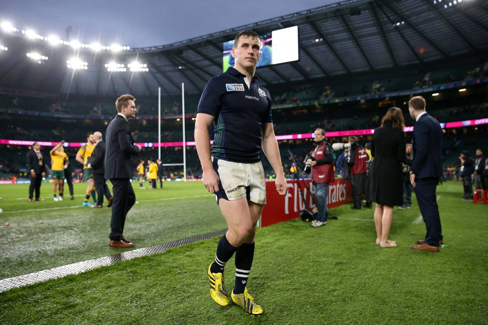 Scotland's Mark Bennett is left dejected after the final whistle of the Rugby World Cup match at Twickenham Stadium, London.