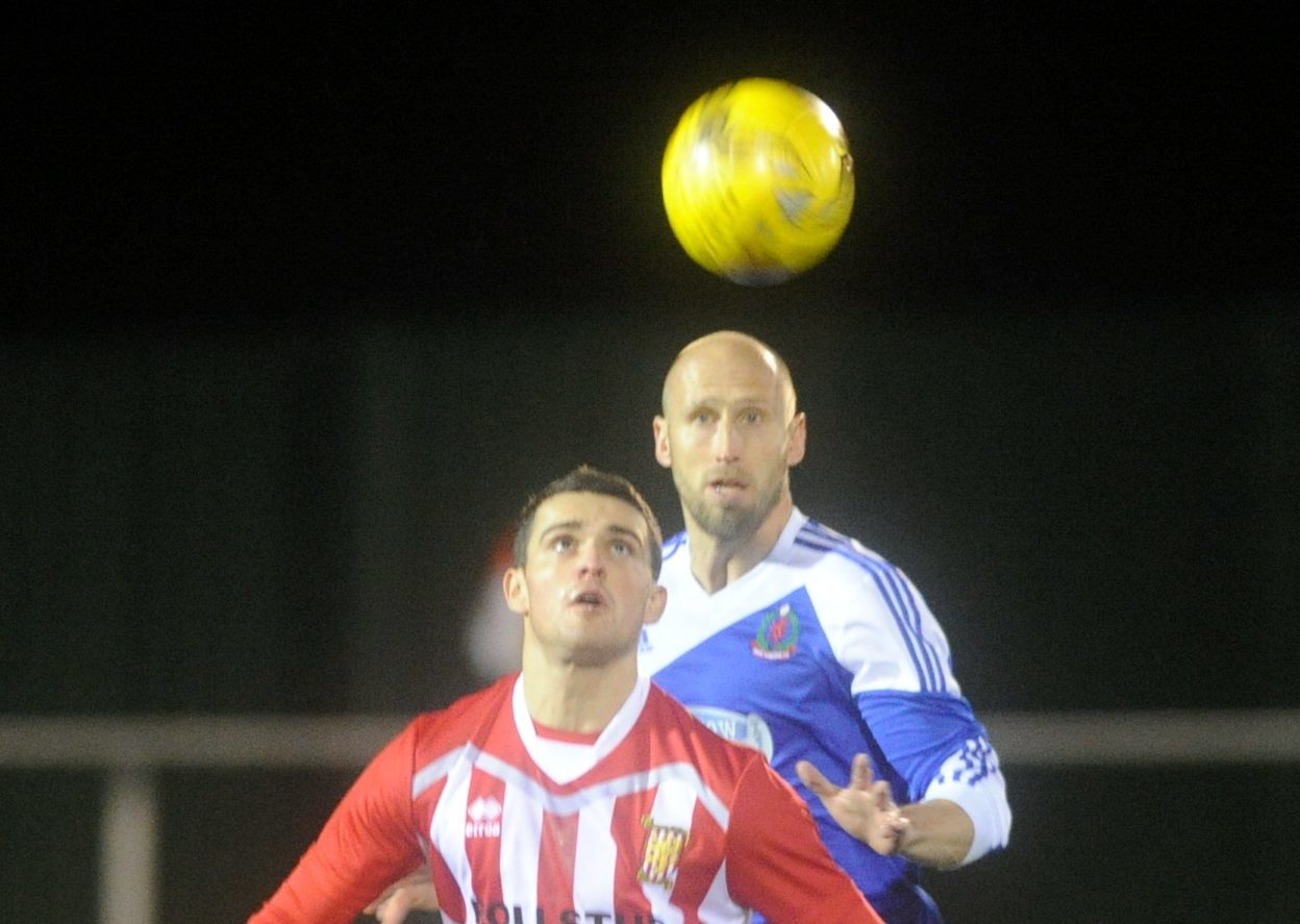 Cove's Alan Redford, right, and Formartine’s Scott Barbour battle it out.