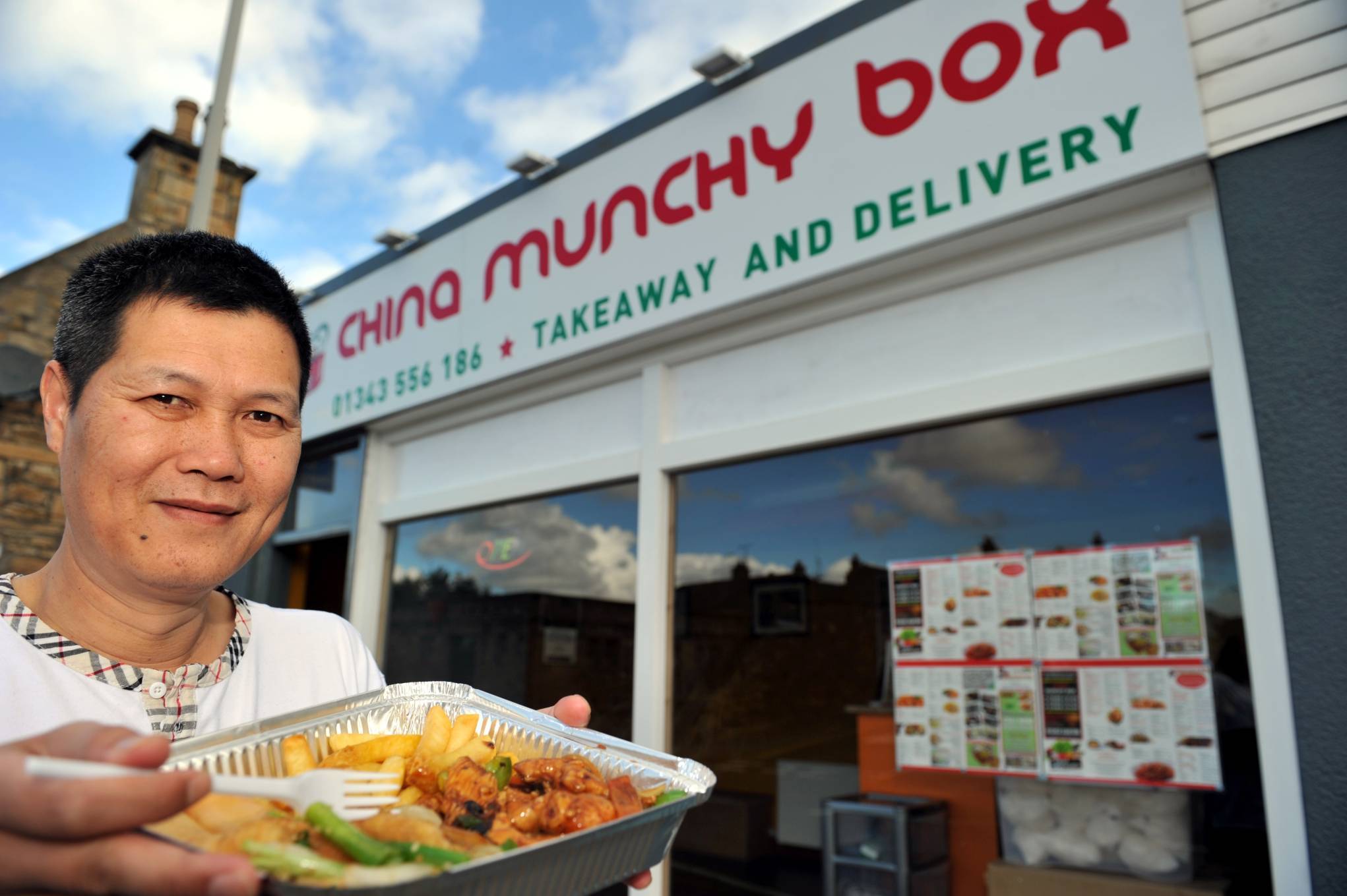 Tony Liang, outside his Chinese takeaway shop in North Street, Elgin.