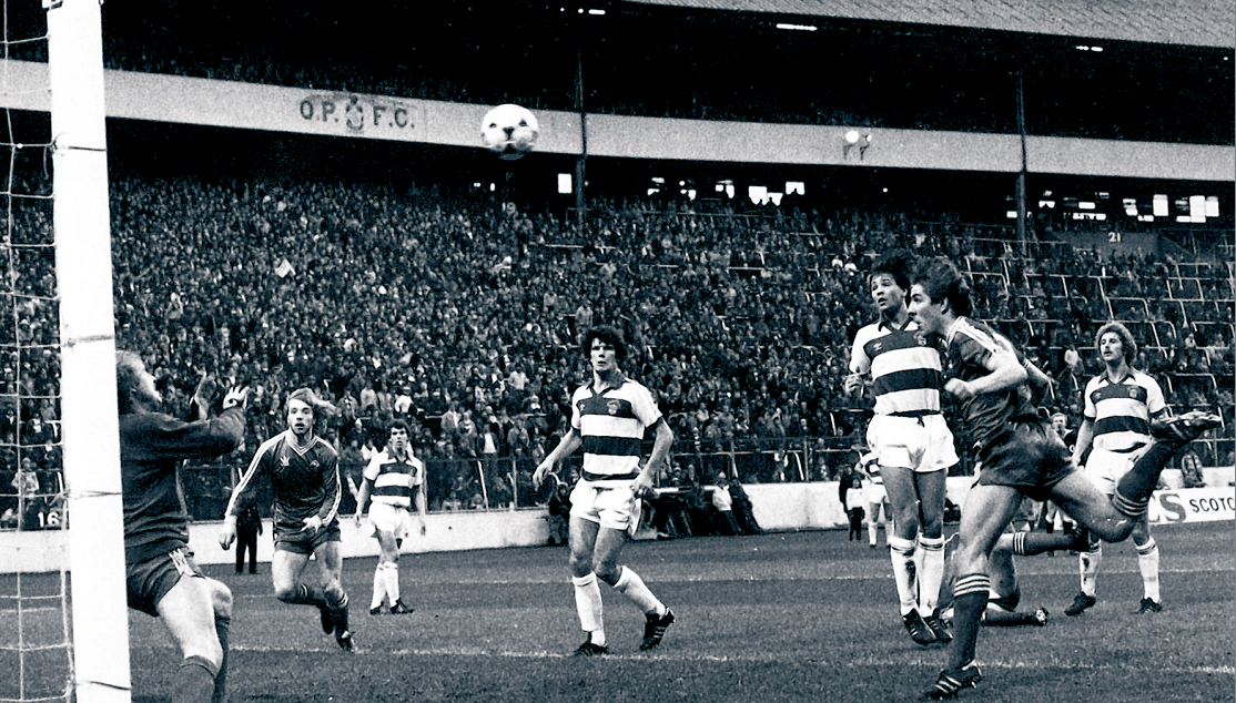 Mark McGhee heads over Roy Baines for the opening goal.
