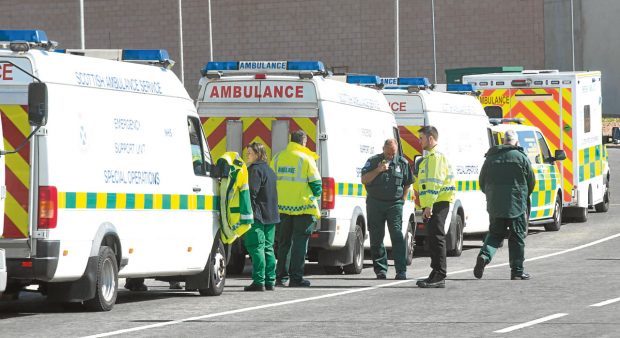 Ambulance and police outside the prison.