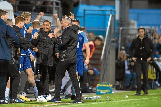 The Peterhead staff celebrate Rory McAllister's last minute winner.