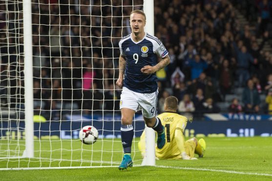 Scotland's Leigh Griffiths celebrates after scoring his side's second goal.