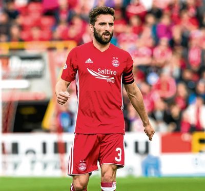 Graeme Shinnie in action for Aberdeen.