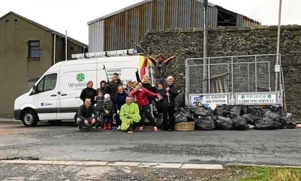 Fraserburgh litter pick at Four Corners. and its a group organised by a Fraserburgh gym owner called Milena Tkacz.
She owns the PolFit fitness studio on Fraserburghs high street.