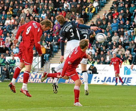Lee Miller scores his goal during the match at Falkirk Stadium, Falkirk.