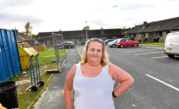 Yvonne Barnett, who has been living out of boxes for a week.