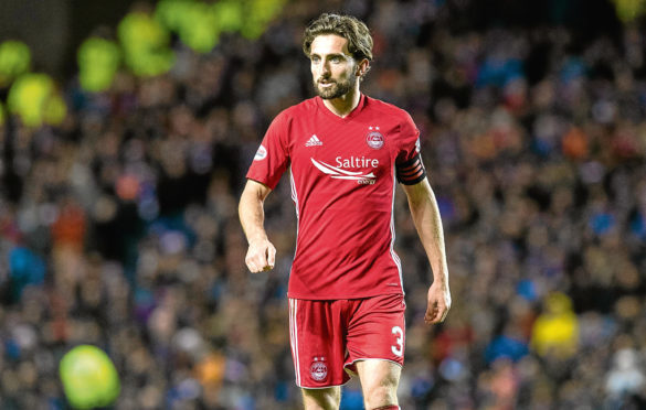 Returning skipper Graeme Shinnie netted the opening goal for Aberdeen in the Scottish Cup quarter-final.