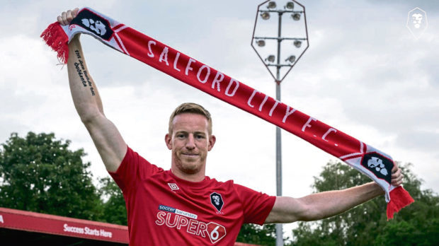 Adam Rooney in Salford City colours after leaving the Dons