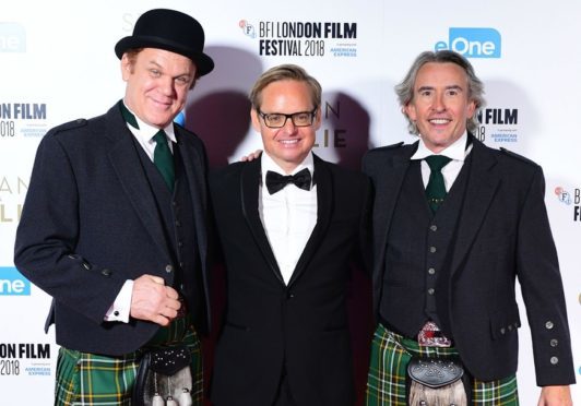 Steve Coogan and Jon C Reilly stand alongside director Jon S Baird at the premiere