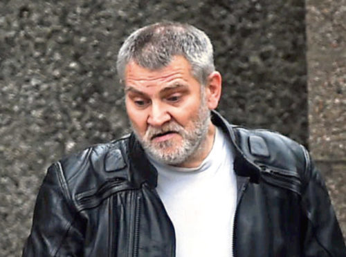David Patterson made racial comments to a Portuguese shop worker after being caught stealing a bottle of wine