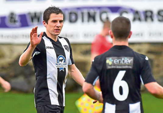 Paul Young celebrates his goal.