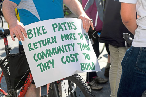 The Aberdeen Cycle Forum held a protest outside Marischal College against the lack of provision for cyclists on the AWPR