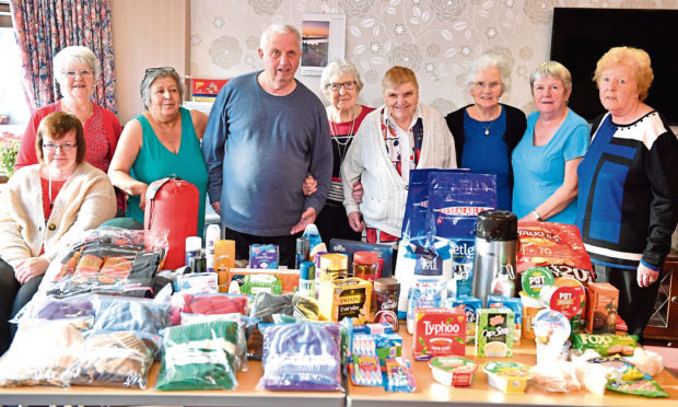 Residents of Crichie Court, Stuartfield, have knitted hats and scarfs and also collected sleeping bags and food for the homeless charity Street Friends