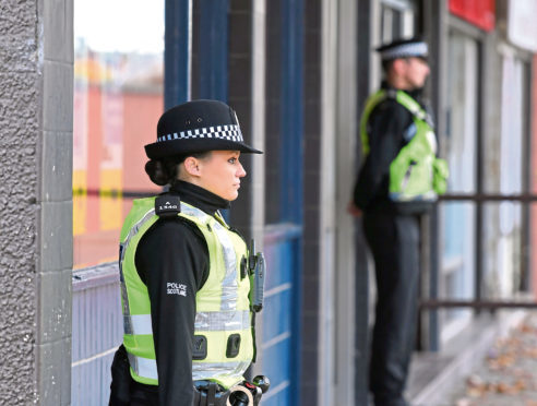 Police at the William Hill shop in Summerhill