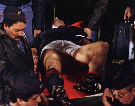 Ally McCoist with a broken leg during the match with Portugal at the Estadio de Luz.