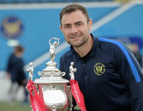 Jamie Watt with the Evening Express Aberdeenshire Cup.