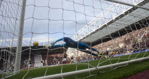 Aberdeen's Joe Lewis saves Hearts' Steven Naismith second half penalty.