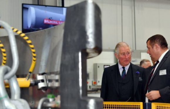 HRH Prince Charles, The Duke of Rothesay, visited Balmoral Offshore Engineering, Aberdeen to officially open the new Balmoral Subsea Test Centre. Pictured - Prince Charles is shown around the new test centre by Derek Weir