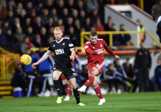 James Wilson scores to put the Dons 2-0 up