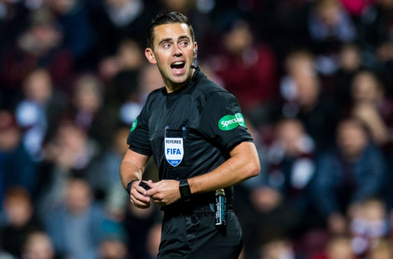 Referee Andrew Dallas.