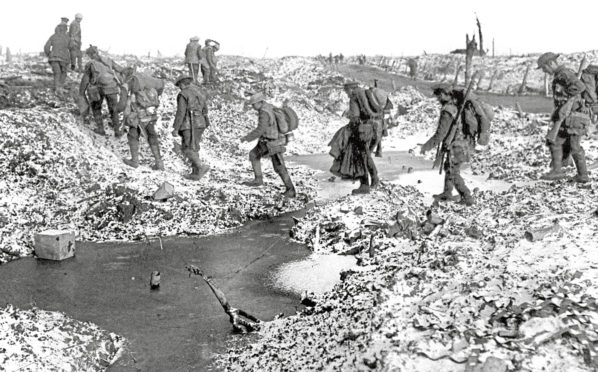 British soldiers negotiating craters near the River Somme in late 1916