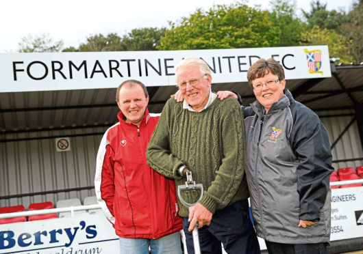Adam Grant, centre, with his son Colin and daughter Maureen at Formartine United's North Lodge Park