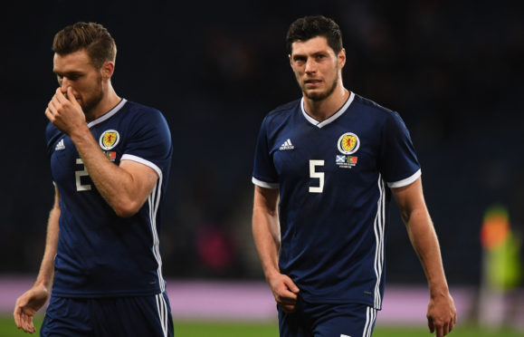 Scott McKenna, right.