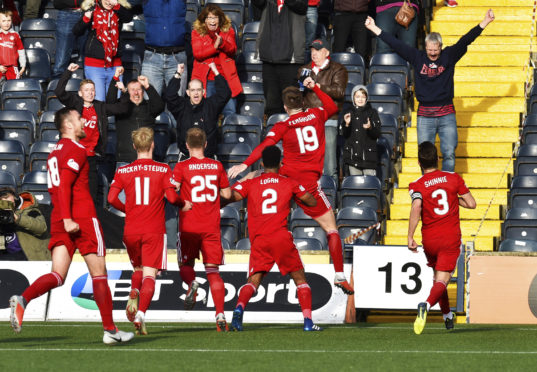 Aberdeen's Lewis Ferguson celebrates after scoring to make it 2-1