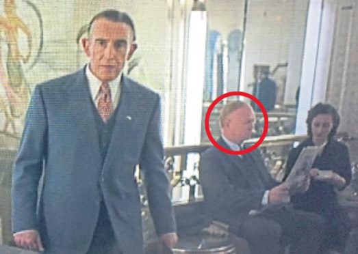This exclusive picture shows Alex McLeish,
circled, in a scene from Stan & Ollie