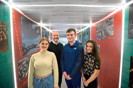 Iain MacRitchie, Founder of MCR Pathways, with some of the mentees.