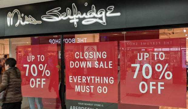 Signs were posted in the window at Miss Selfridge