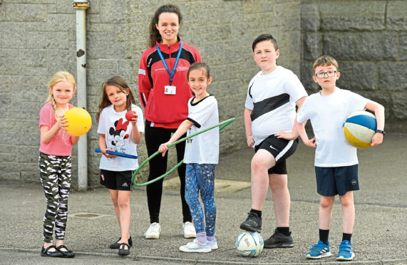Jo with pupils, from left, Ellie Sword, Naomi Stout, Raewyn Samul, Archie Morris and Lee Cruickshank